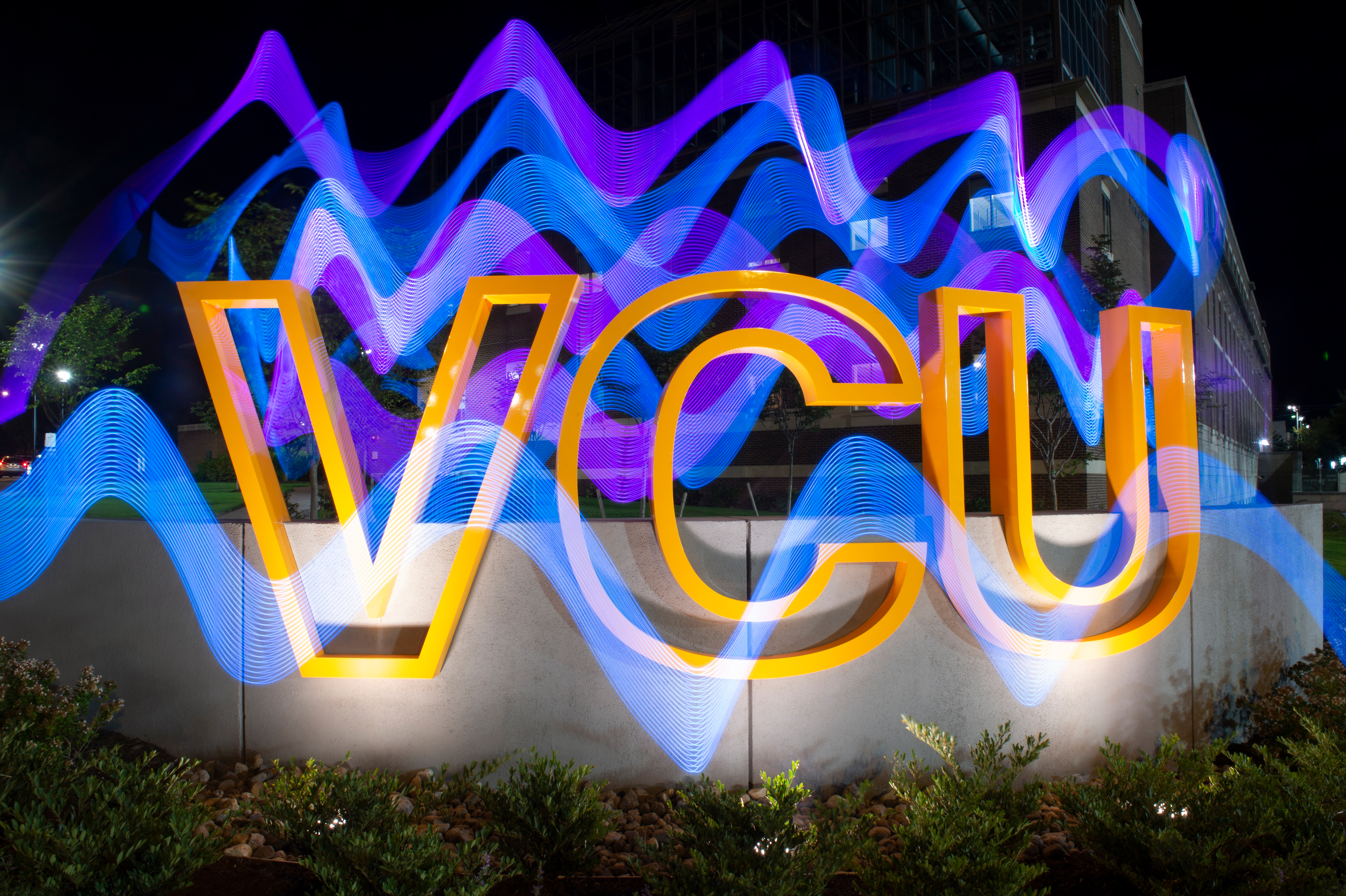 VCU Sign Wiggly Lights Night